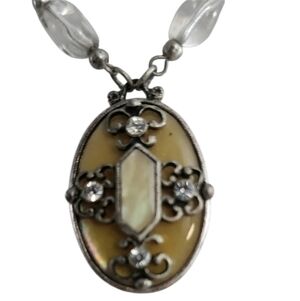 Silver Tone Gold and Oval Pendant Necklace